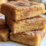 Easy Snickerdoodle Cookie Bars Recipe | Chewy, Sweet Cinnamon Delight 5 Chewy snickerdoodle cookie bars with cinnamon sugar topping