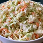 Creamy KFC coleslaw with shredded cabbage and carrots