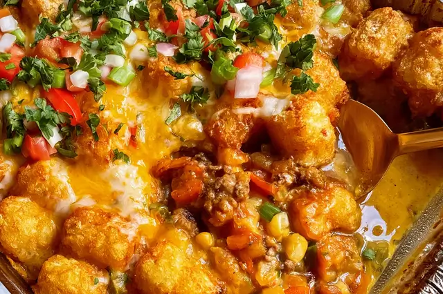 Bacon cheeseburger tater tot casserole with crispy golden tots