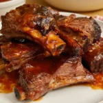 Slow Cooker Barbequed Beef Ribs: Tender & Easy Recipe 5 Slow cooker barbequed beef ribs with smoky BBQ sauce