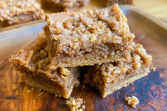 Brown sugar babe dessert bar baked golden brown in an 8x8 baking dish.