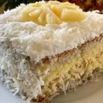 Pineapple coconut cake with sweet pineapple and shredded coconut