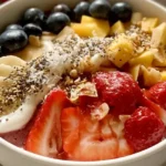 Tropical Smoothie acai bowl with fresh fruit and granola