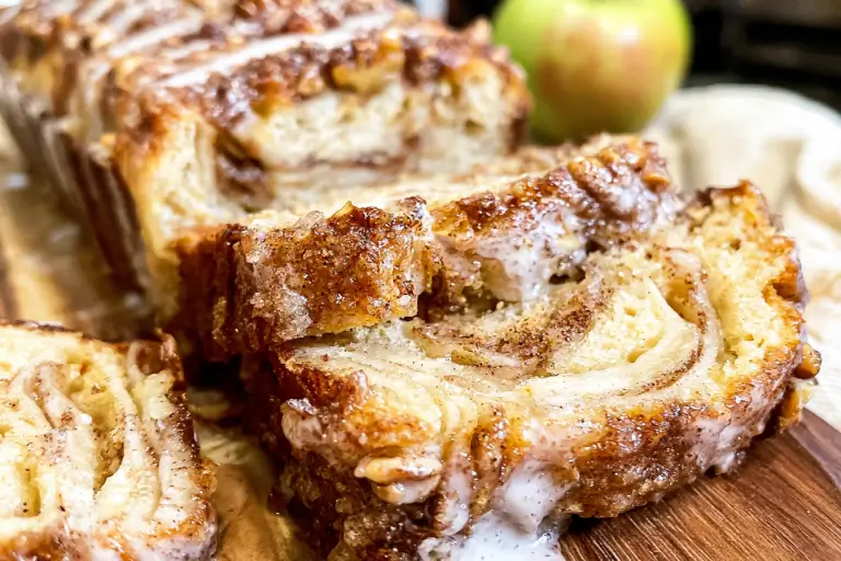Glazed luscious country apple fritter bread with cinnamon swirl and fresh diced apples