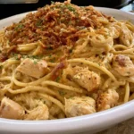 Crockpot Parmesan Garlic Chicken Spaghetti – Easy, Creamy & Delicious Family Dinner 5 Slow cooker creamy parmesan garlic chicken spaghetti garnished with fresh herbs and grated cheese.