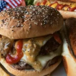 Grilled juicy cheeseburgers, corn on the cob, and side salad for a 4th of July feast.