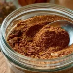Homemade Zap Your Taste Buds seasoning blend made with smoked paprika, garlic, and dried herbs.