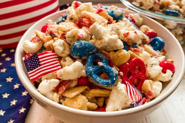 4th of July snack mix with white chocolate coated cereal, pretzels, and festive M&Ms.