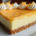Creamsicle Cheesecake Bars - A Sweet Treat You'll Love 5 Creamsicle Cheesecake Bars on a Serving Plate