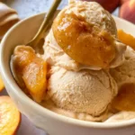 Best Peach Ice Cream: Delightfully Creamy Summer Treat 5 Creamy homemade peach ice cream churned with fresh ripe peaches, heavy cream, and vanilla.