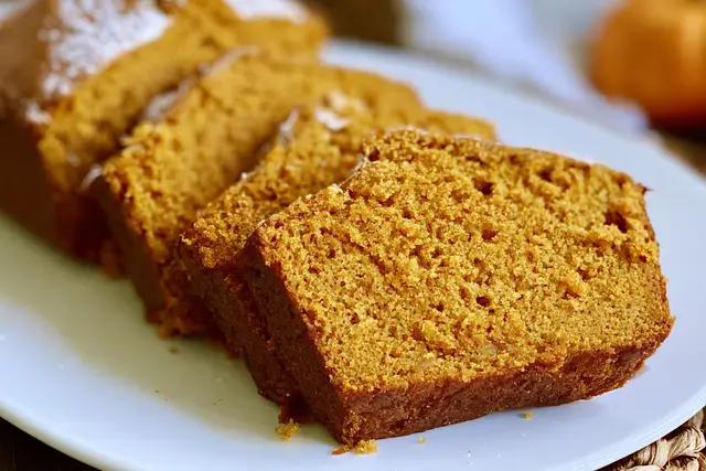 Spiced pumpkin gingerbread loaf made with pumpkin puree, ginger, cinnamon, allspice, and cloves