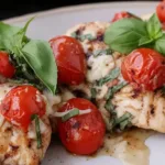 Caprese Chicken Plated with Fresh Basil and Tomatoes