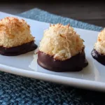 Delicious Chocolate-Dipped Coconut Macaroons on a Plate