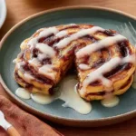 Cinnamon Roll Pancakes with Cream Cheese Drizzle