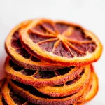 Dried Orange Slices on a Wooden Board