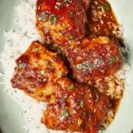 Honey Garlic Chicken Thighs Served with Fresh Herbs