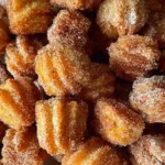 Deliciously Crispy Air Fryer Churro Bites on a Plate