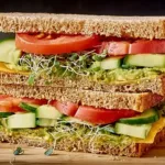 Cucumber-Avocado-Tomato Sandwich Served on a Plate