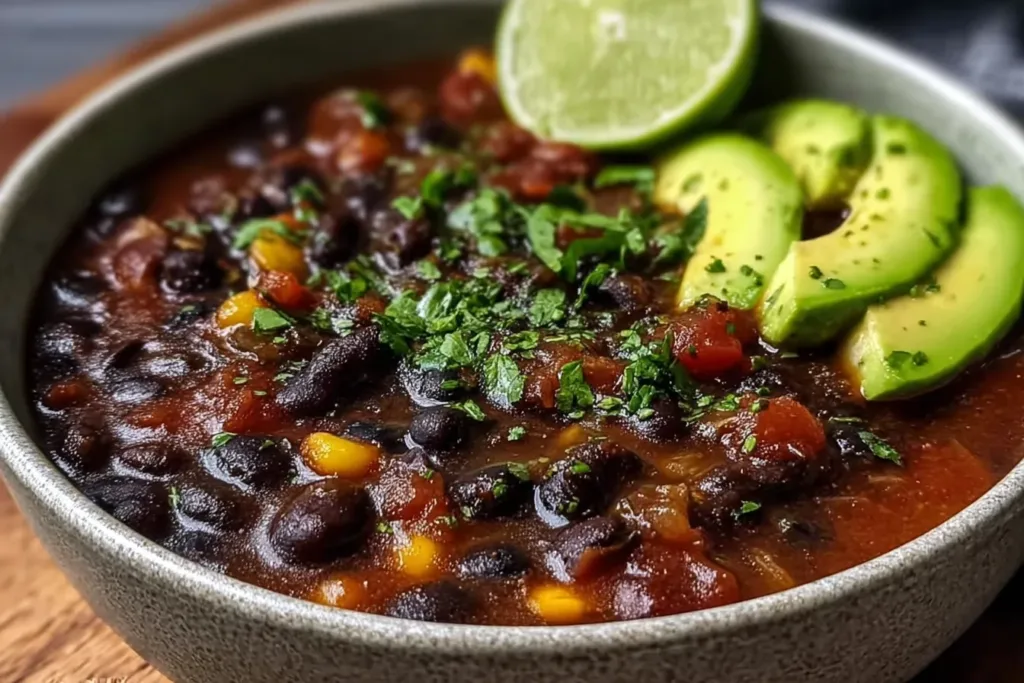 Daniel Fast Black Bean Soup in a Bowl with Avocado Slices