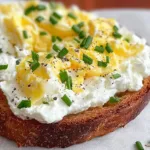 Easy 6-Ingredient Egg and Ricotta Toast on a Breakfast Plate