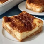 Delicious Easy Churro Cheesecake Bars on a Plate