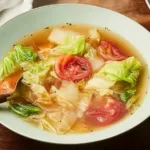 Healing Cabbage Soup Steaming in a Bowl