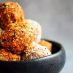 Healthy Carrot Cake Energy Balls on a Plate