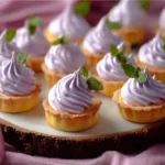 Mini Lemon Tart with Lilac Meringue Garnished Elegantly
