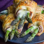 Delicious Prosciutto Asparagus Puff Pastry Bundles on a Platter
