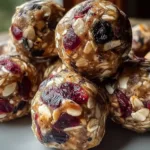 Delicious Cherry Cranberry Energy Bites on a Plate