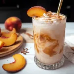 Refreshing Peach Cobbler Chai Latte in a Summer Glass