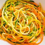Spiralized Carrot Zucchini Salad in a bowl