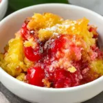 Easy Cherry Pineapple Dump Cake Served on a Plate