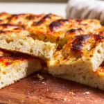 Freshly Baked Focaccia Bread with Herbs and Olive Oil