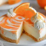 No-Bake Orange Creamsicle Cheesecake Slice on a Plate