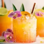 Pineapple Mango Rum Punch in a Glass with Fresh Fruits