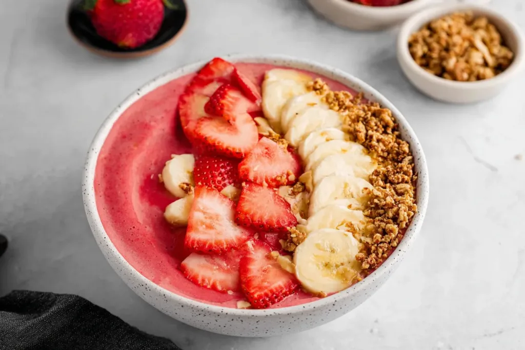 Strawberry Banana Smoothie Bowl Topped with Fresh Fruits