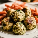 Baked Chicken Meatballs: Delicious and Healthy Dinner Idea 5 Baked Chicken Meatballs on a Serving Platter