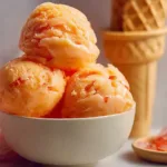 Best Peach Sorbet in a Bowl with Fresh Peaches