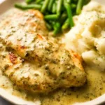 Creamy Pesto Chicken: A Dish That Will Delight You 5 Creamy Pesto Chicken Plated with Fresh Basil