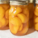 Fresh Honey Syrup Canned Peaches: A Sweet Delight Just for You 5 Fresh Honey Syrup Canned Peaches with Mint Garnish