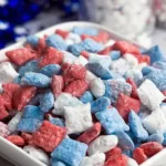 Festive Patriotic Muddy Buddies on a Colorful Plate