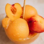 Perfect Peach Sorbet: A Refreshing Summer Treat 5 Delicious Perfect Peach Sorbet in a Bowl