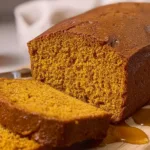 Delicious Pumpkin Pie Bread Slice on a Rustic Table