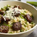 Delicious Sausage and Garlic Scape Risotto in a Bowl
