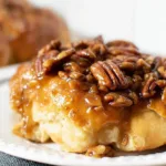 Sourdough Focaccia Sticky Buns: A Delicious Treat to Enjoy 5 Sourdough Focaccia Sticky Buns Freshly Baked on a Plate