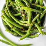 Stir Fried Garlic Scapes on a Plate