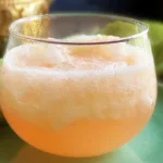 Grandma’s Peach Punch in a Glass with Fresh Peaches