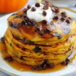 Pumpkin Spice Pancakes with Chocolate Chips: A Fall Delight 5 Pumpkin Spice Pancakes with Chocolate Chips Served Warm