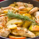Sautéed Chicken and Apples with Rosemary on a Plate